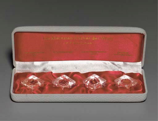 [MINIATURE BOOKS]. "Die kleinsten Bücher der Welt in 7 Sprachen: Der olympische Eid. Das Vaterunser. Der Freiheitsschwur Berlin. Der Satz "Ich liebe Dich" [case title]. Germany, n.d. [circa 1950].