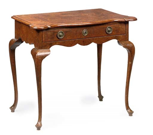A WALNUT AND CROSSBANDED SIDE TABLE