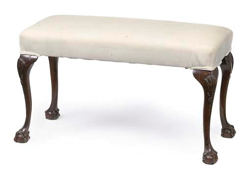 A MAHOGANY LONG STOOL