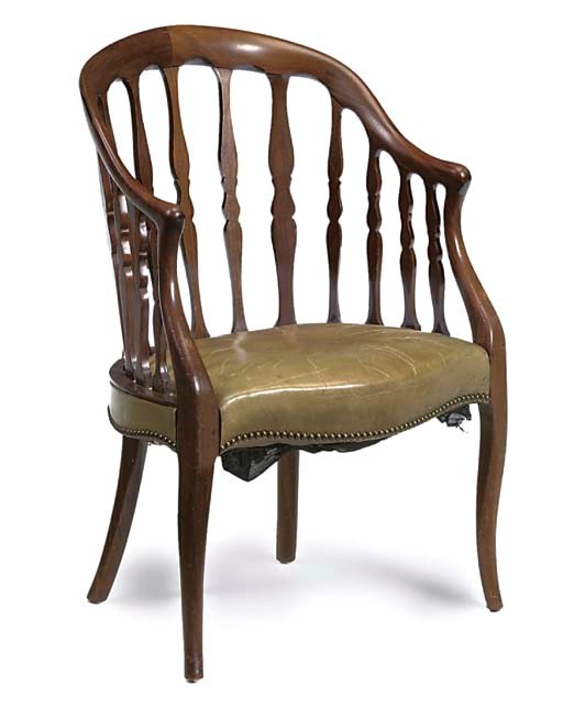 A MAHOGANY DESK BERGERE