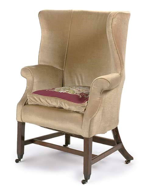 A GEORGE III MAHOGANY TUB WING ARMCHAIR