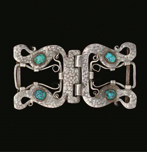 A LIBERTY & CO. CYMRIC SILVER AND TURQUOISE BUCKLE