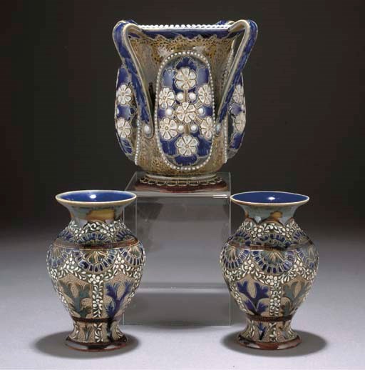 A DOULTON LAMBETH STONEWARE FOUR-HANDLED VASE
