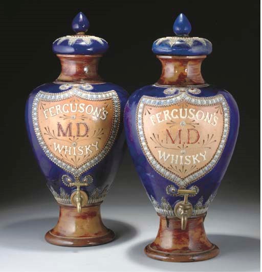 A PAIR OF DOULTON LAMBETH STONEWARE FERGUSON'S M D WHISKY JARS AND COVERS