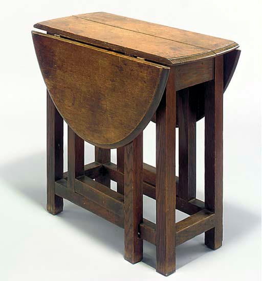 A LIBERTY & CO. OAK GATE-LEG TABLE