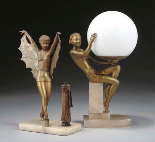 AN ART DECO SPELTER, ONYX AND GLASS FIGURAL LAMP