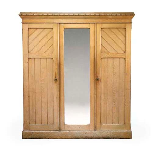 A LATE VICTORIAN ASH WARDROBE