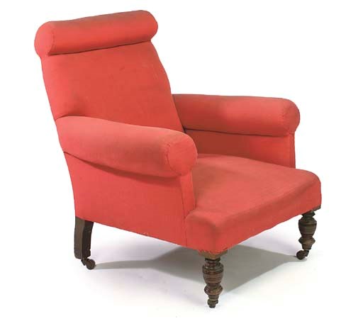 A LATE VICTORIAN GRAINED EASY ARMCHAIR