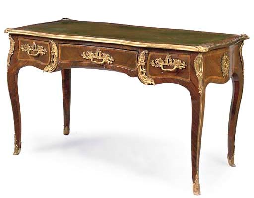 A FRENCH KINGWOOD, TULIPWOOD CROSS-BANDED AND ORMOLU-MOUNTED SERPENTINE BUREAU PLAT