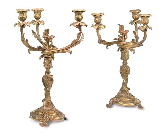 A PAIR OF GILT-EMBOSSED SHEET METAL THREE-LIGHT CANDELABRA