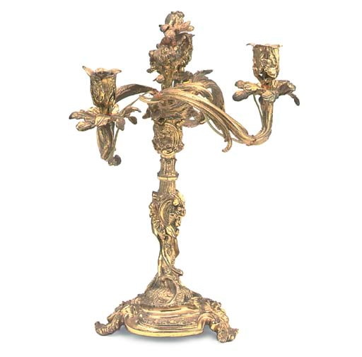 A MID-VICTORIAN GILT-BRONZE THREE-LIGHT CANDELABRUM