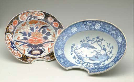 A CHINESE EXPORT BLUE AND WHITE BARBER'S BOWL TOGETHER WITH A JAPANESE IMARI EXAMPLE,
