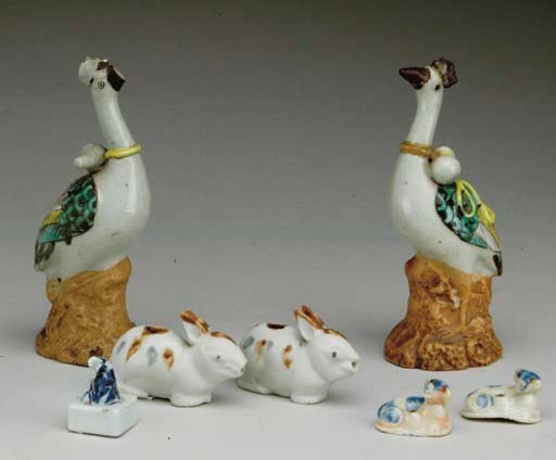 A GROUP OF SEVEN CHINESE GLAZED CERAMIC ANIMALS,