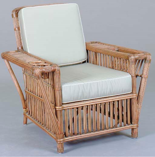 A SET OF THREE RATTAN PATIO LOUNGE CHAIRS WITH FOAM CUSHION SEATS AND BACKS,