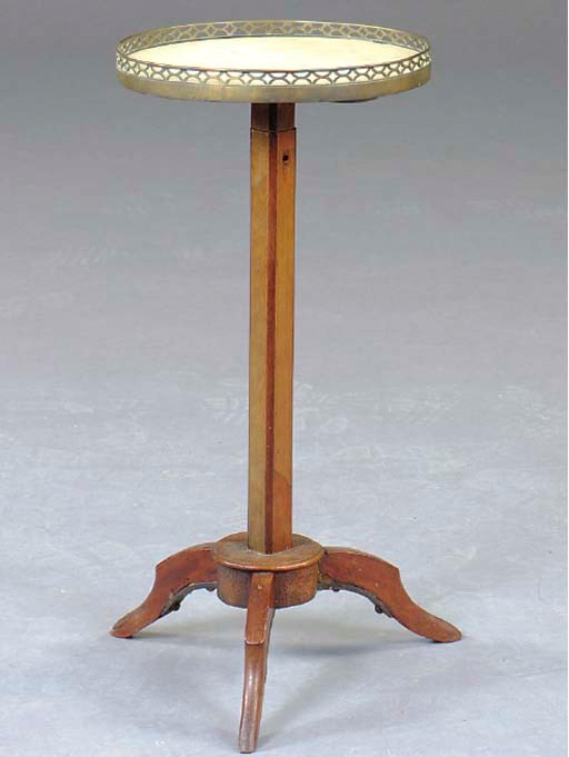 A LOUIS XV STYLE GILT METAL-MOUNTED BEECHWOOD GUERIDON,