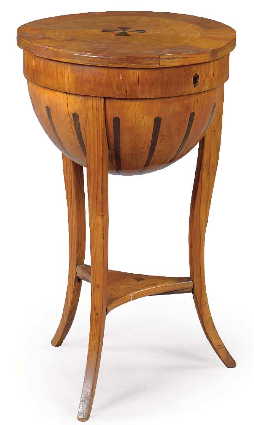 A BIEDERMEIER EBONY-INLAID FRUITWOOD CIRCULAR WORK TABLE,