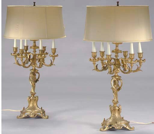 A PAIR OF LOUIS XV STYLE GILT-BRONZE SIX-LIGHT CANDELABRA,