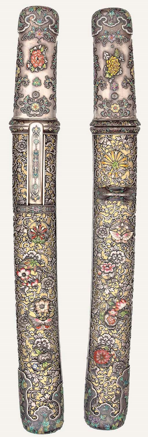 A FINE SILVER MOUNTED AIKUICHI