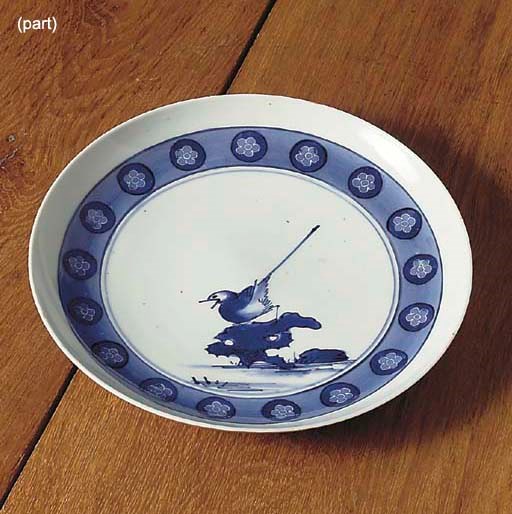 AN IMARI BOWL AND AN ARITA DISH