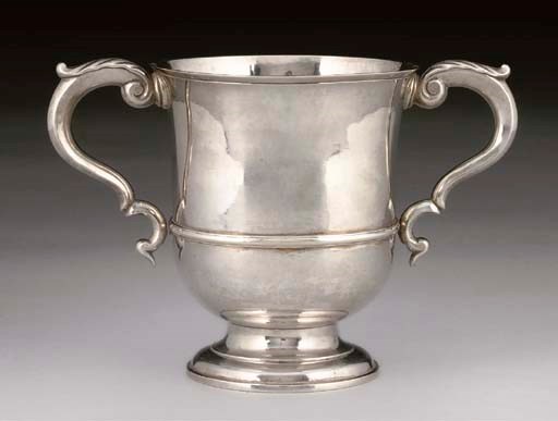 A GEORGE II CHANNEL ISLANDS SILVER PORRINGER OR LOVING CUP,