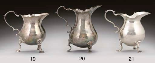 A GEORGE III CHANNEL ISLANDS SILVER CREAM JUG,