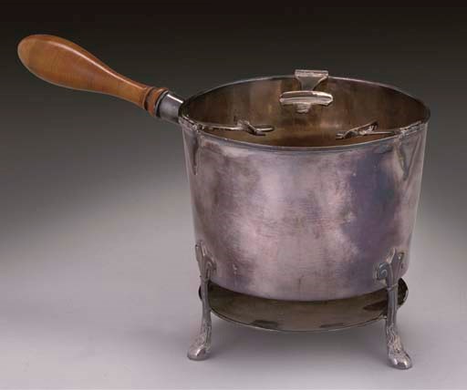 AN UNUSUAL GEORGE III SILVER WARMING STAND,
