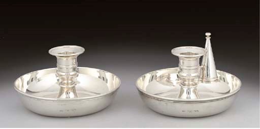 A PAIR OF EARLY VICTORIAN SILVER TRAVELLING CHAMBERSTICKS,