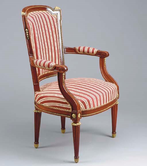 A SET OF FOUR EMPIRE STYLE MAHOGANY CHAIRS,