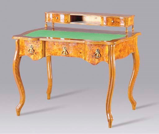 A LOUIS XV STYLE BURR ELM WRITING TABLE,