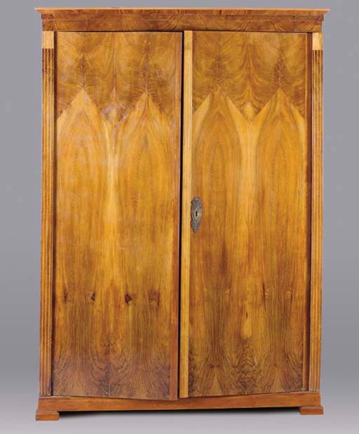 A BIEDERMEIER WALNUT ARMOIRE,
