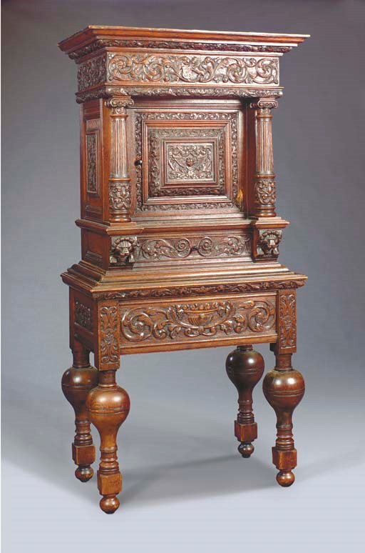 A RENAISSANCE STYLE CARVED OAK COURT CUPBOARD,