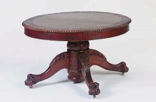 AN AMERICAN EMPIRE STYLE MAHOGANY EXTENDING DINING TABLE,