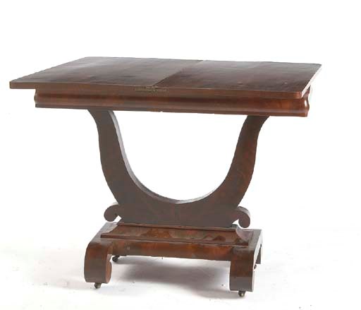 AN AMERICAN EMPIRE MAHOGANY FOLD OVER CARD TABLE,