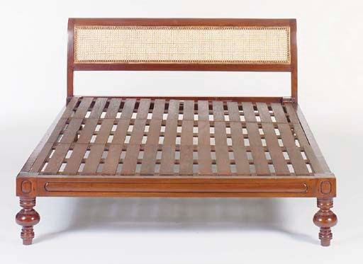 AN ANGLO-INDIAN STYLE HARDWOOD AND CANED QUEEN SIZE BED FRAME,