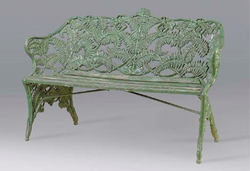 A GREEN PAINTED CAST IRON AND WOOD GARDEN BENCH,