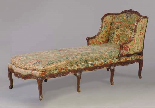 A REGENCE GROS-POINT COVERED WALNUT DUCHESSE,