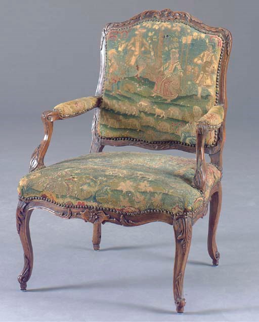 A LOUIS XV STYLE STAINED BEECHWOOD PETIT-POINT AND GROS-POINT COVERED FAUTEUIL A LA REINE,