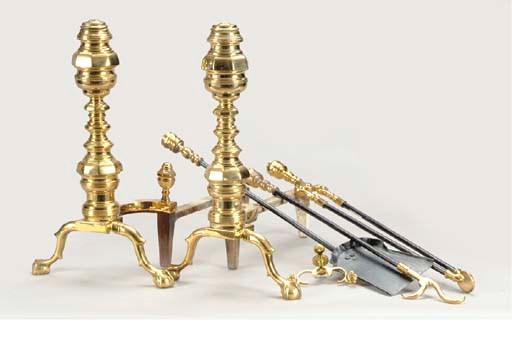 A PAIR OF ENGLISH BRASS ANDIRONS AND THREE FIRETOOLS,