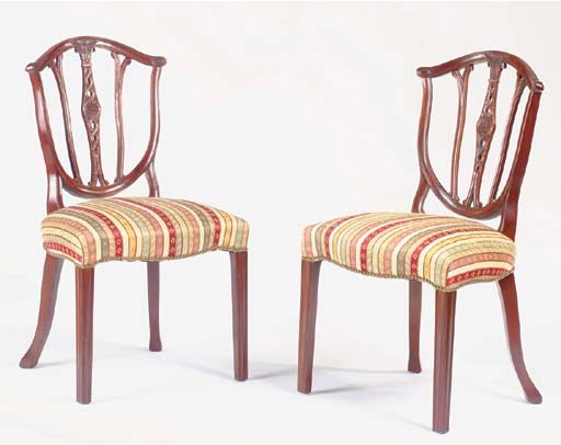 A SET OF FOUR GEORGE III STYLE MAHOGANY DINING CHAIRS,