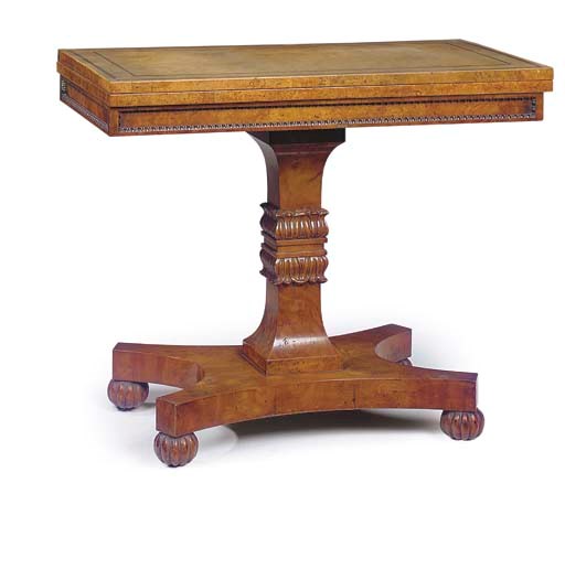 A REGENCY BURR ELM GAMES TABLE