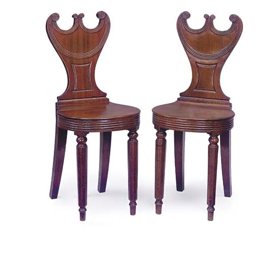 A PAIR OF REGENCY MAHOGANY HALL CHAIRS