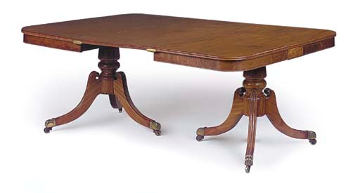 A MAHOGANY TWIN PEDESTAL DINING TABLE