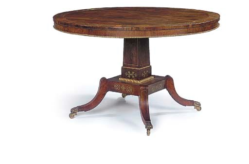 A REGENCY ROSEWOOD AND BRASS INLAID CIRCULAR CENTRE TABLE