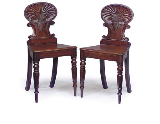 A PAIR OF WILLIAM IV MAHOGANY HALL CHAIRS