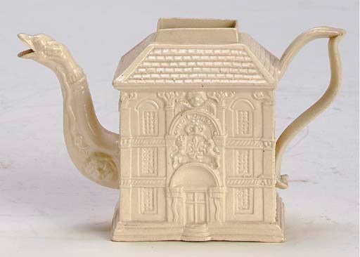 A STAFFORDSHIRE WHITE SALT-GLAZE STONEWARE 'HOUSE' TEAPOT,