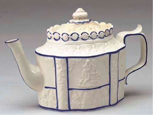 AN ENGLISH SALT-GLAZED MOULDED TEAPOT AND COVER,