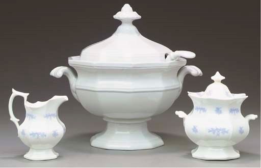 A GROUP OF WHITE-GLAZED EARTHENWARE TABLE ARTICLES,