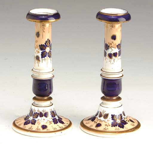 A MATCHED PAIR OF PEACH-GROUND ENGLISH CANDLESTICKS,