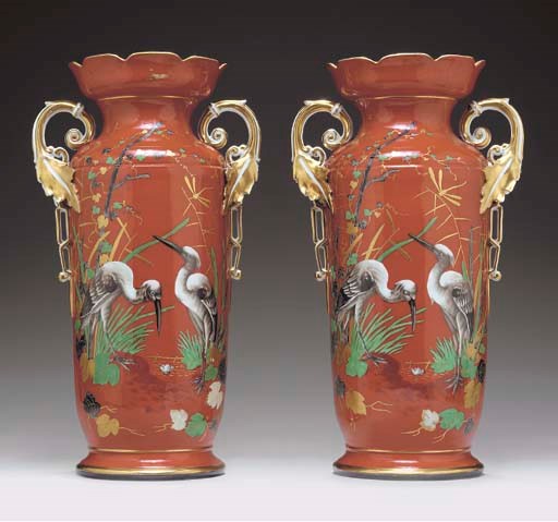 A PAIR OF LARGE CONTINENTAL IRON-RED GROUND VASES,