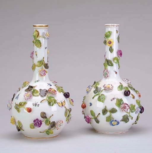 A PAIR OF GERMAN FLOWER-ENCRUSTED BOTTLE VASES,